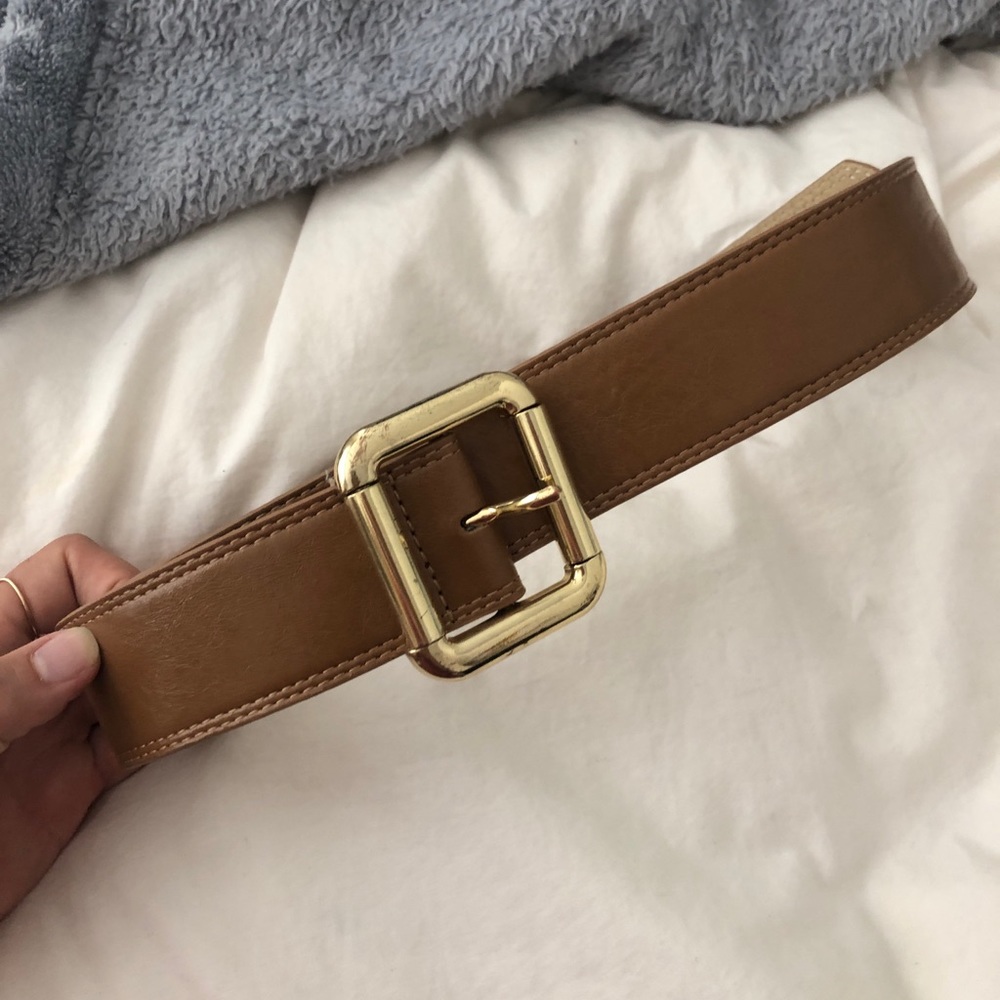 Brown belt gold buckle